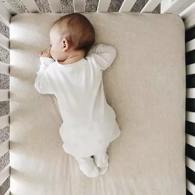 Baby sleeping in crib