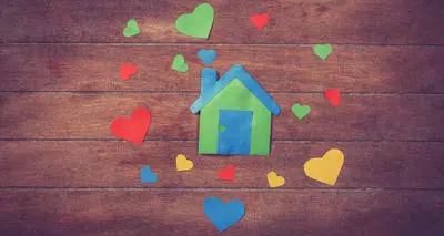 Paper house with hearts